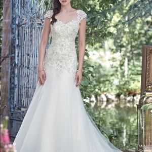 Never worn or altered Maggie Sottero Wedding Dress